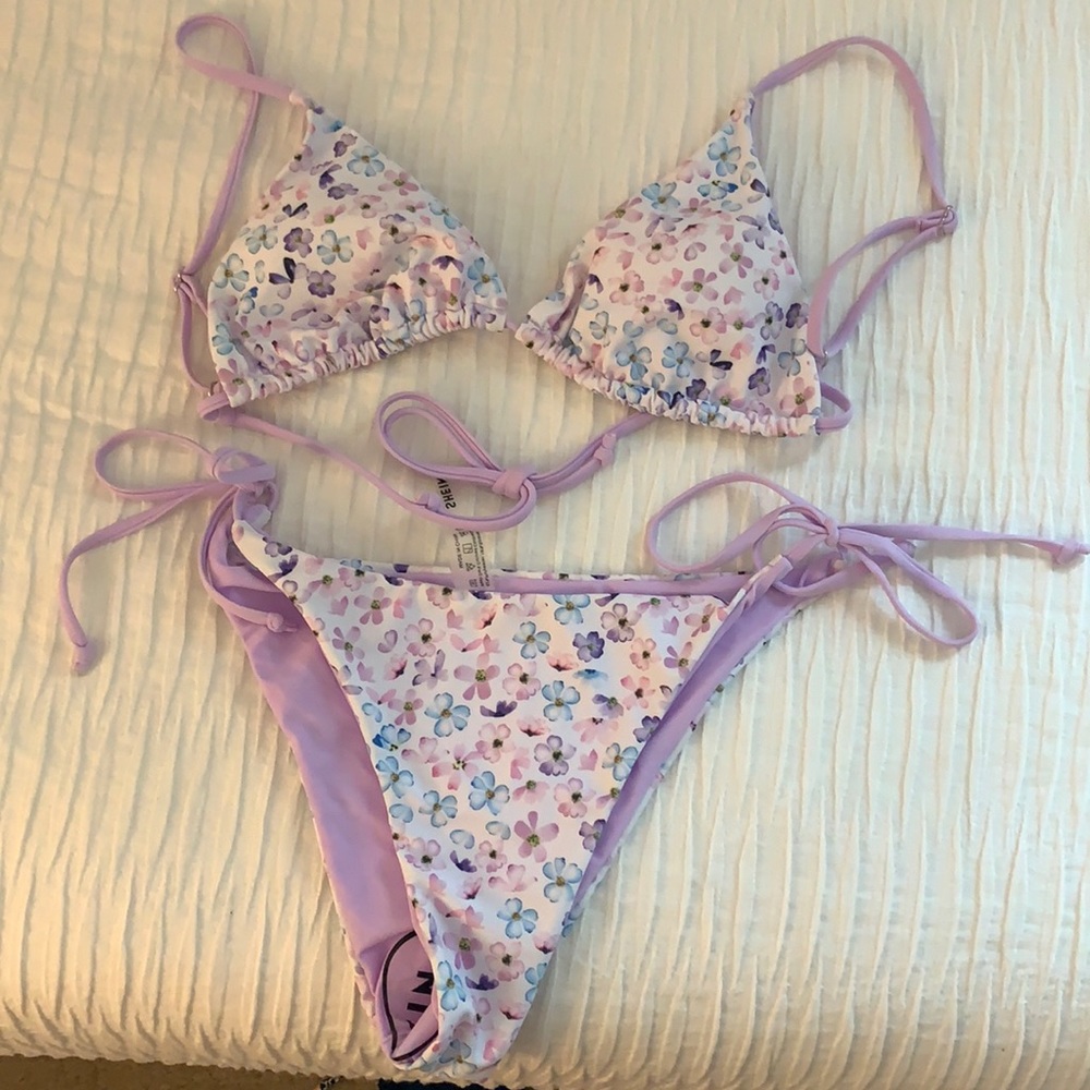 Pastel colored floral adjustable bathing suit.